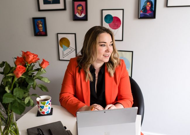 Brand shoot coach at laptop