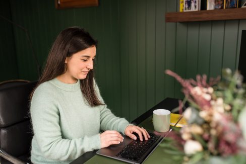 brand working on laptop