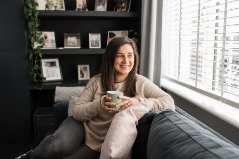 brand on sofa with coffee