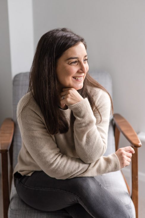 brand looking away smiling